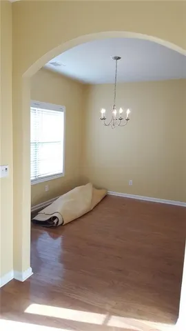a view of a livingroom with a hardwood floor