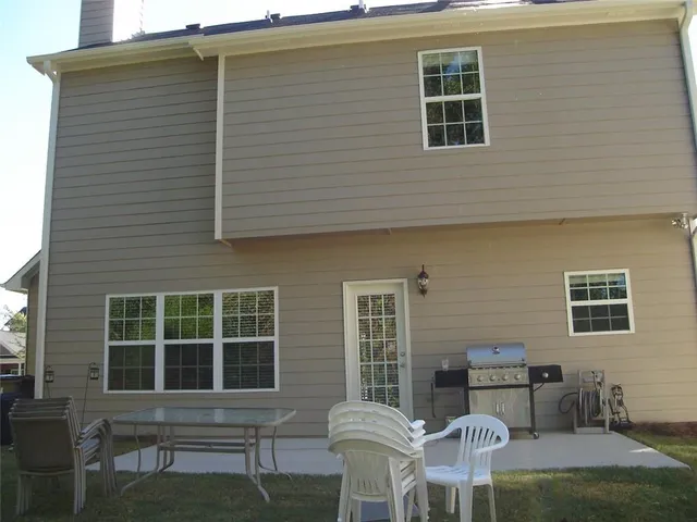 a view of a house with a patio