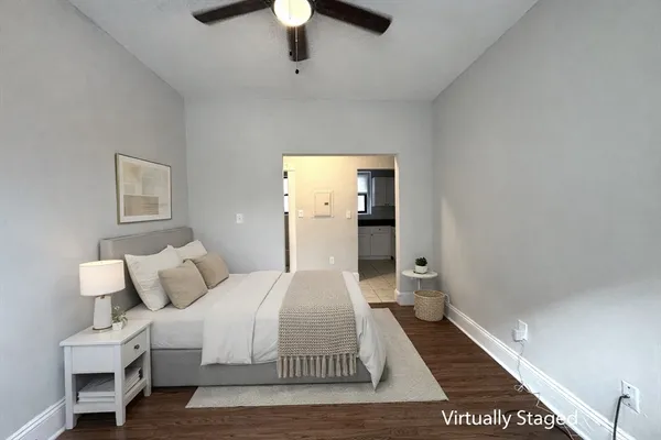 a bedroom with a bed and a walk in closet