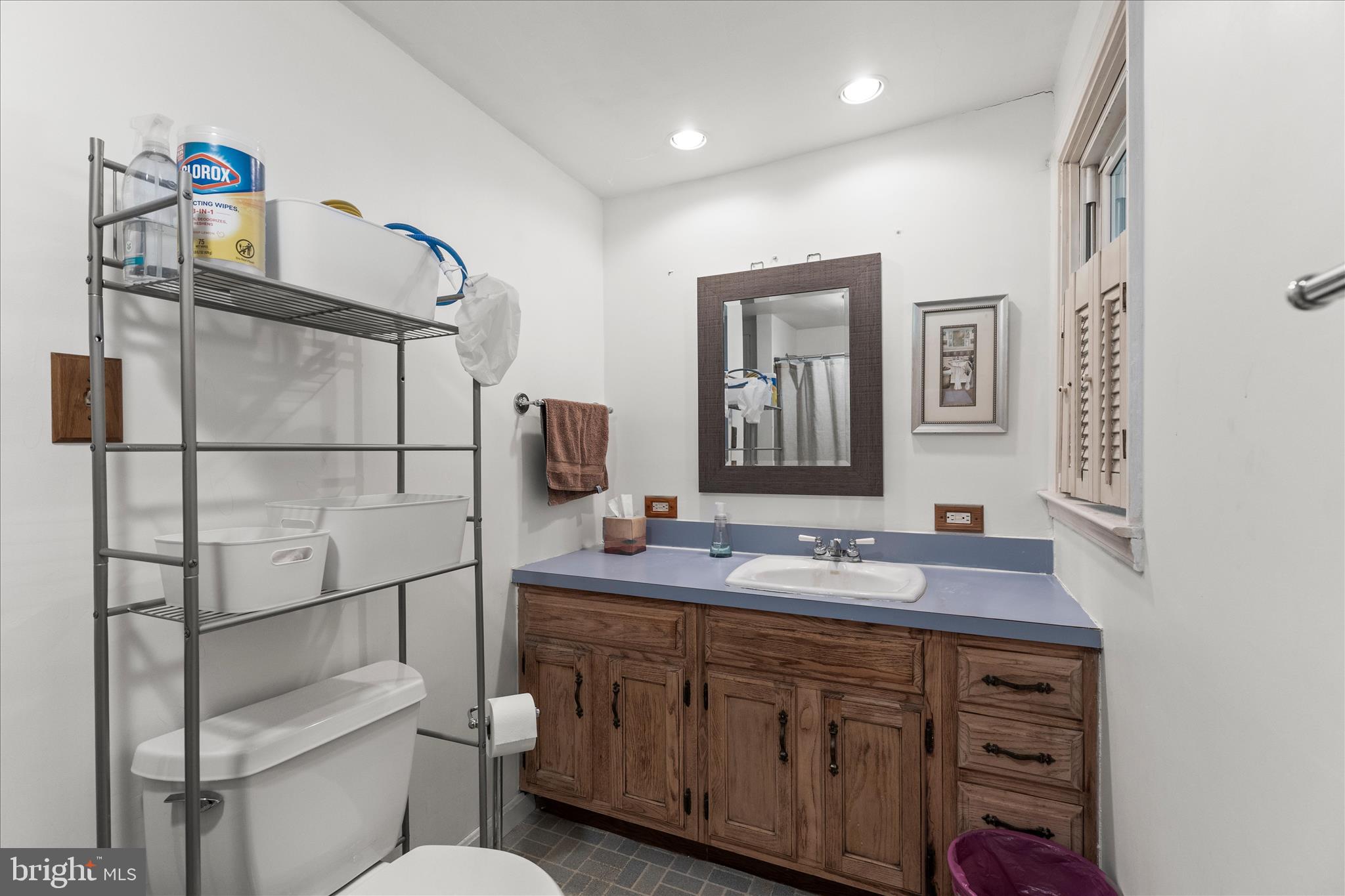 2963 Spring Valley Road Lancaster, PA 17601 - Photo 18 of 42 a bathroom with a toilet sink and mirror