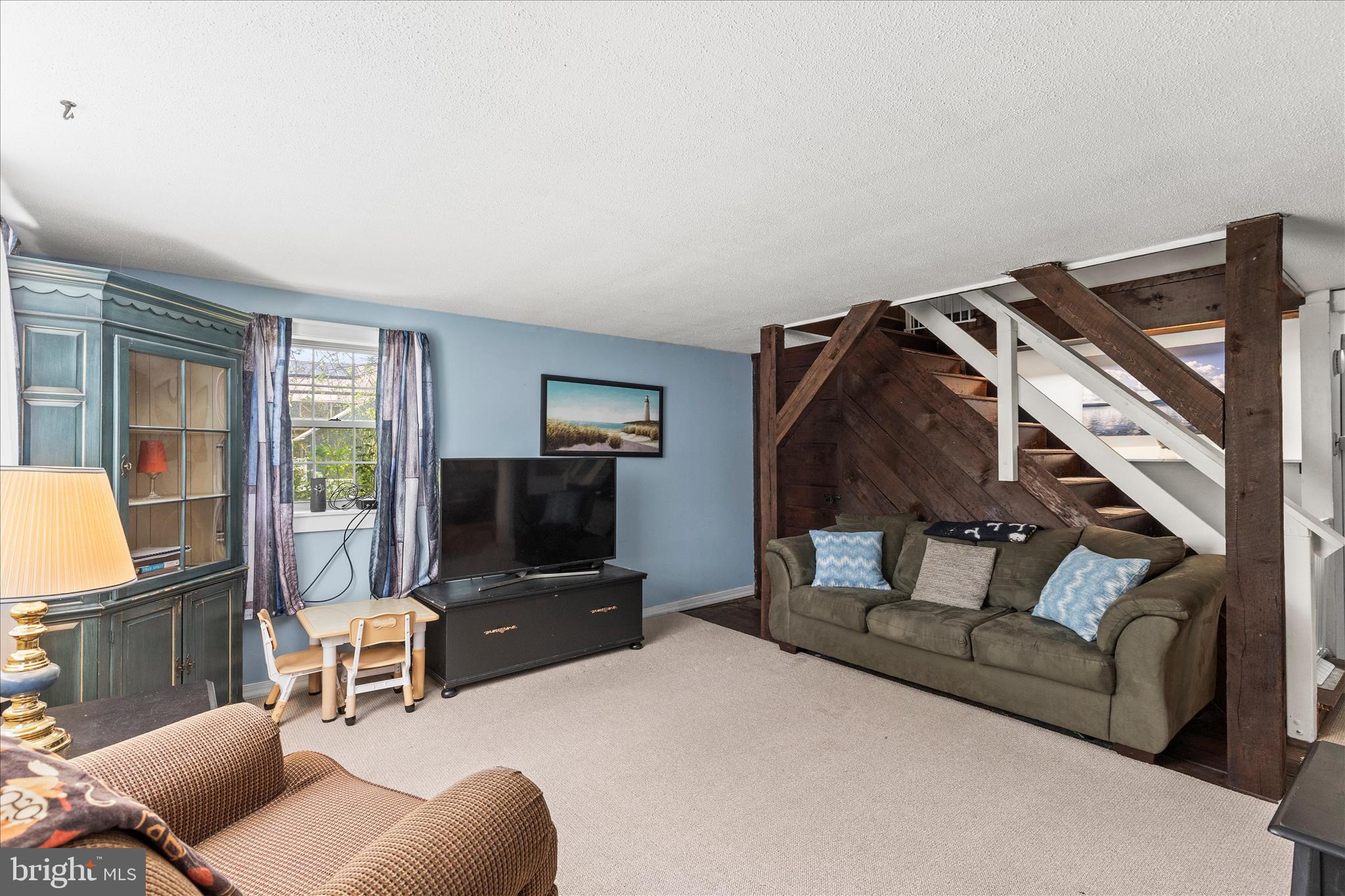2963 Spring Valley Road Lancaster, PA 17601 - Photo 5 of 42 a living room with furniture and a flat screen tv