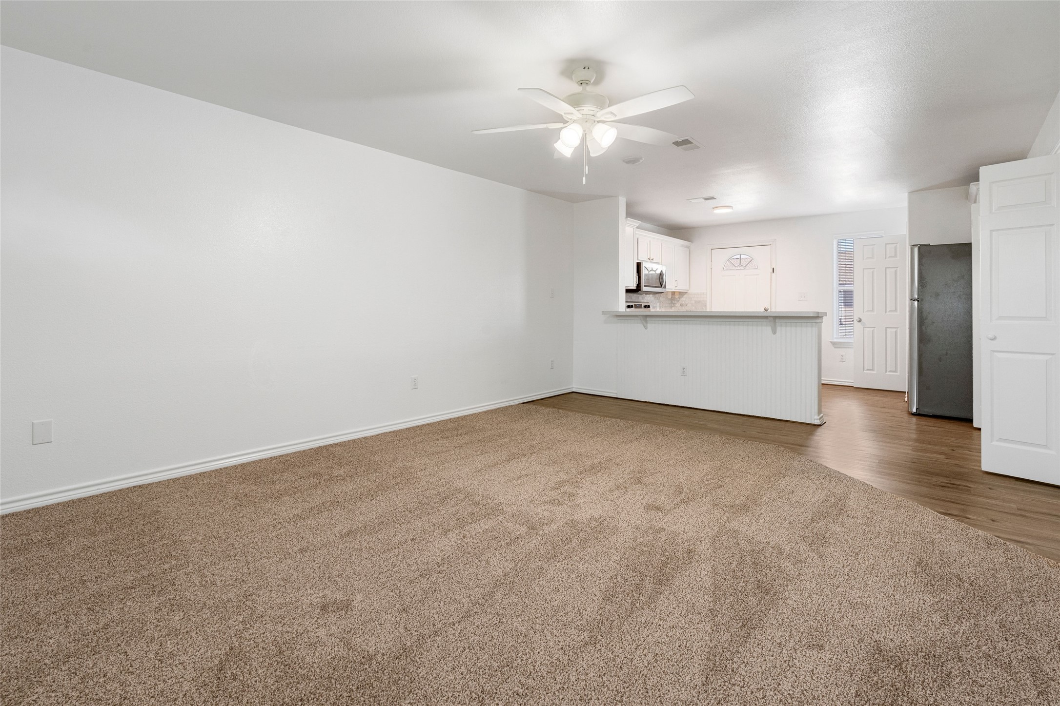 210 Brazos Street, Unit 202 Brazoria, TX 77422 - Photo 11 of 20 a view of a kitchen with a sink