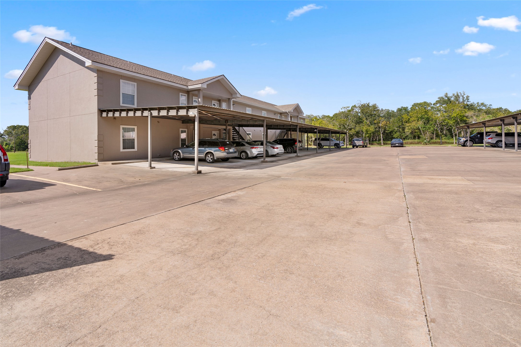 210 Brazos Street, Unit 202 Brazoria, TX 77422 - Photo 19 of 20 a roof deck with yard and outdoor seating