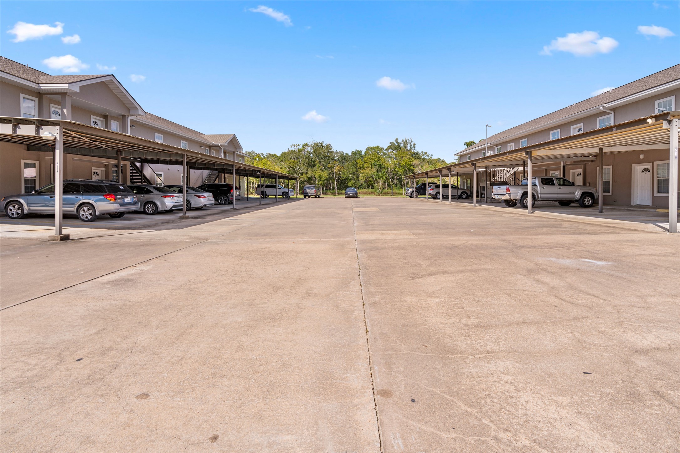 210 Brazos Street, Unit 202 Brazoria, TX 77422 - Photo 20 of 20 a car parked in front of building