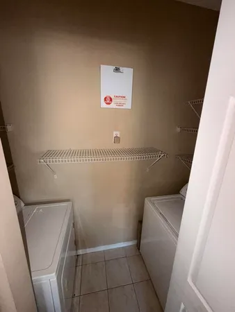 a bathroom with a toilet and a bathtub