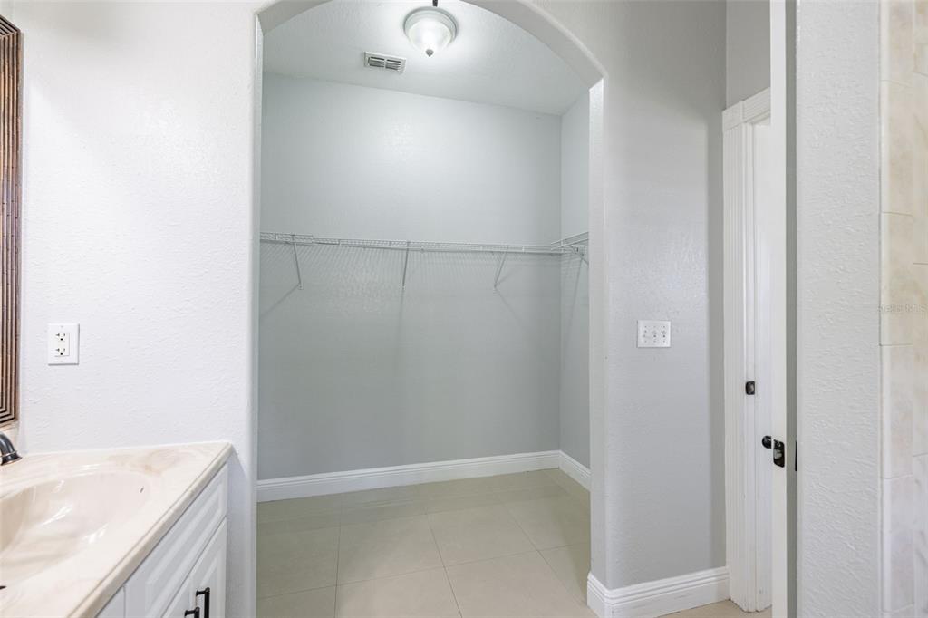 2323 West Cherry Street Tampa, FL 33607 - Photo 10 of 20 a bathroom with a bathtub and a sink
