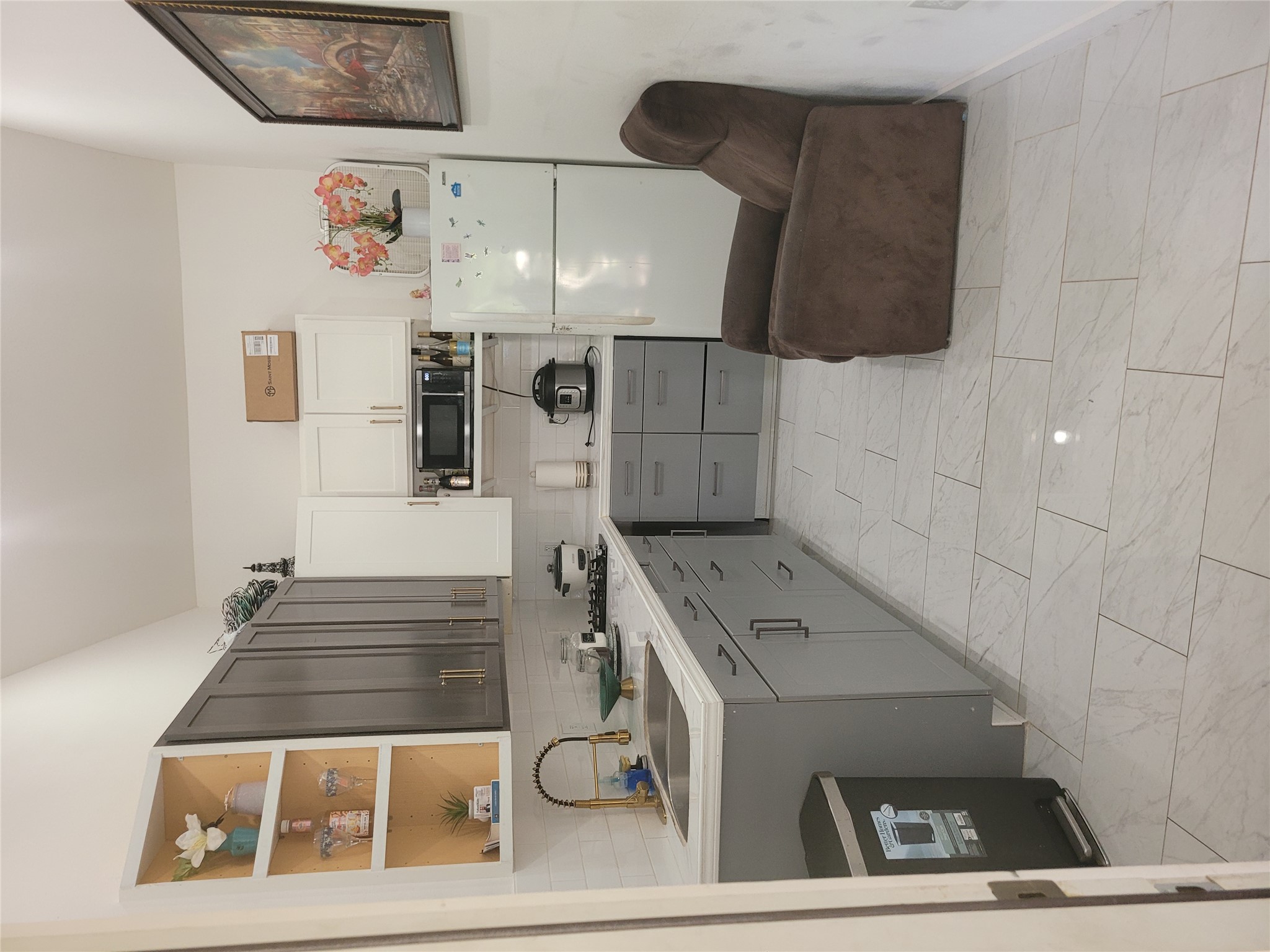 233 St Mary's Road Dale, TX 78616 - Photo 6 of 25 a kitchen with a sink appliances and cabinets