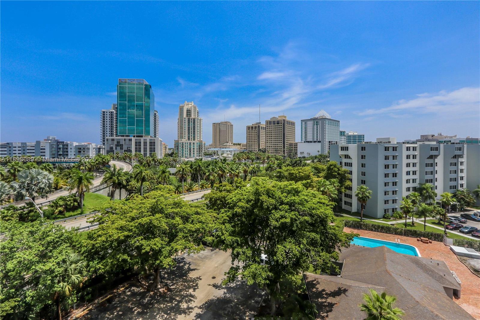 9001 Southwest 77th Avenue, Unit C803 Miami, FL 33156 - Photo 17 of 20 a view of a city with tall buildings