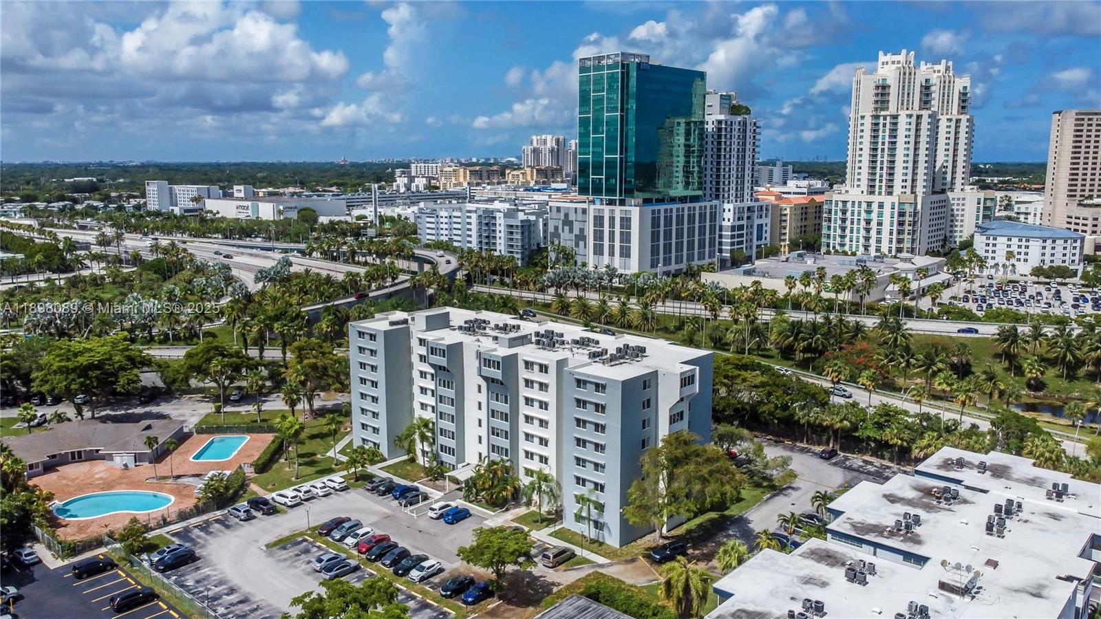 9001 Southwest 77th Avenue, Unit C803 Miami, FL 33156 - Photo 20 of 20 a view of a city with tall buildings