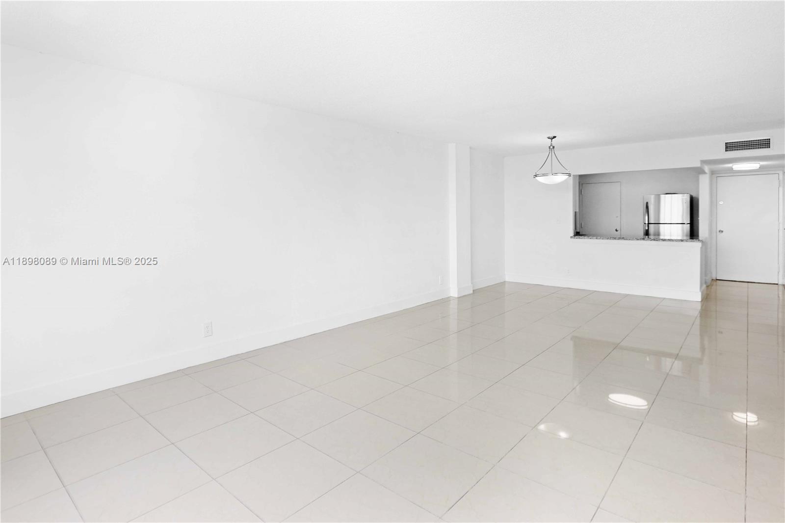 9001 Southwest 77th Avenue, Unit C803 Miami, FL 33156 - Photo 5 of 20 a view of a kitchen with marble kitchen