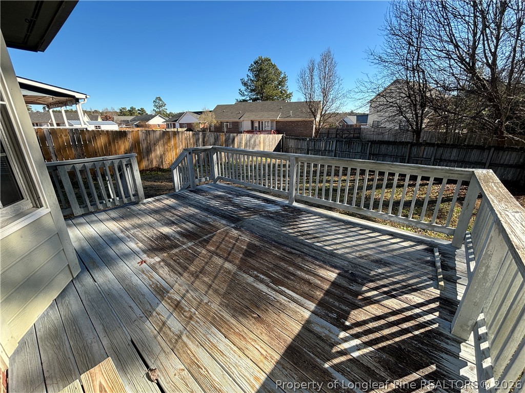 543 Killeen Road Fayetteville, NC 28303 - Photo 3 of 29 a view of balcony with wooden floor