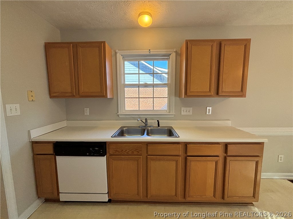543 Killeen Road Fayetteville, NC 28303 - Photo 10 of 29 a kitchen with a sink cabinets and window