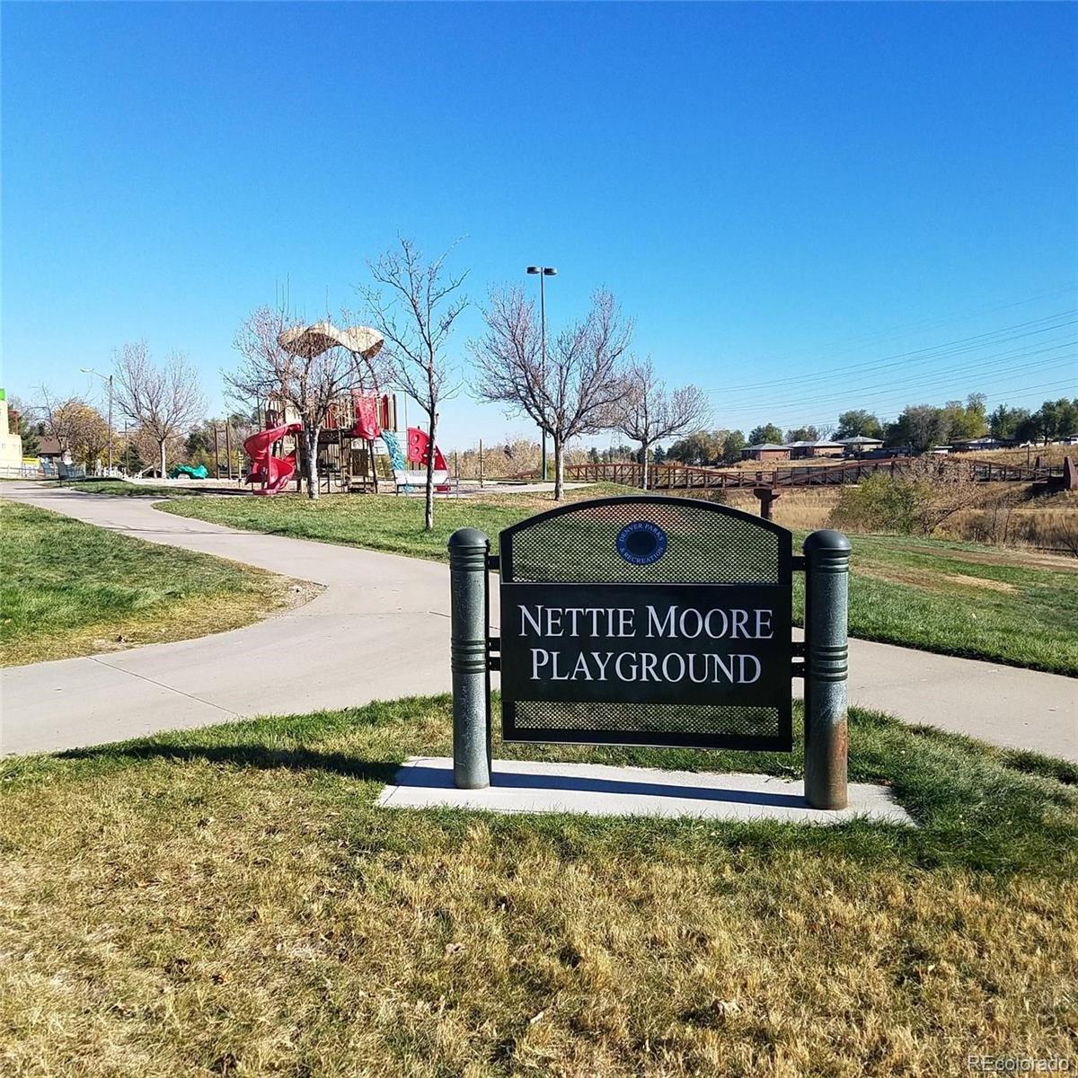 1239 Tennyson Street, Unit 6 Denver, CO 80204 - Photo 12 of 16 a sign on the side of the road