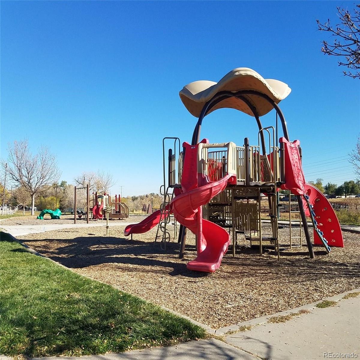 1239 Tennyson Street, Unit 6 Denver, CO 80204 - Photo 13 of 16 a view of outdoor space with playground and entertaining space