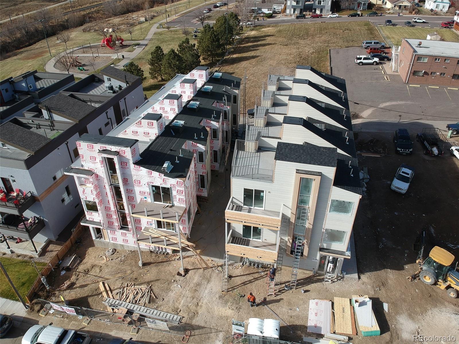 1239 Tennyson Street, Unit 6 Denver, CO 80204 - Photo 2 of 16 an aerial view of residential houses with outdoor space