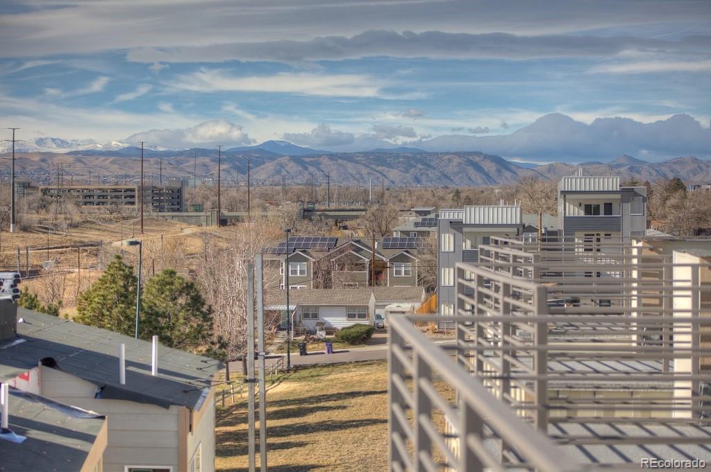 1239 Tennyson Street, Unit 6 Denver, CO 80204 - Photo 5 of 16 a view of a city with tall buildings
