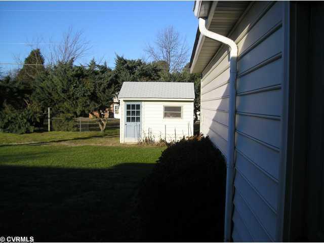 Exterior Front - Front yard shade tree