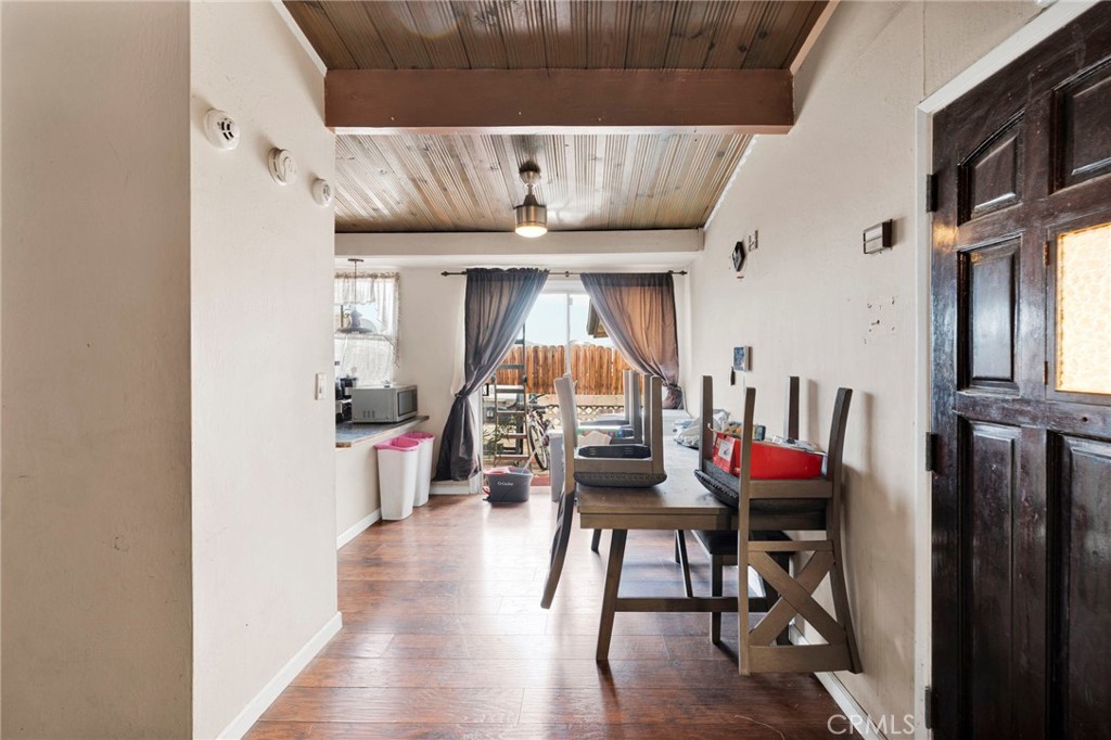 540 Frances Drive Barstow, CA 92311 - Photo 13 of 24 a dining room with furniture and wooden floor