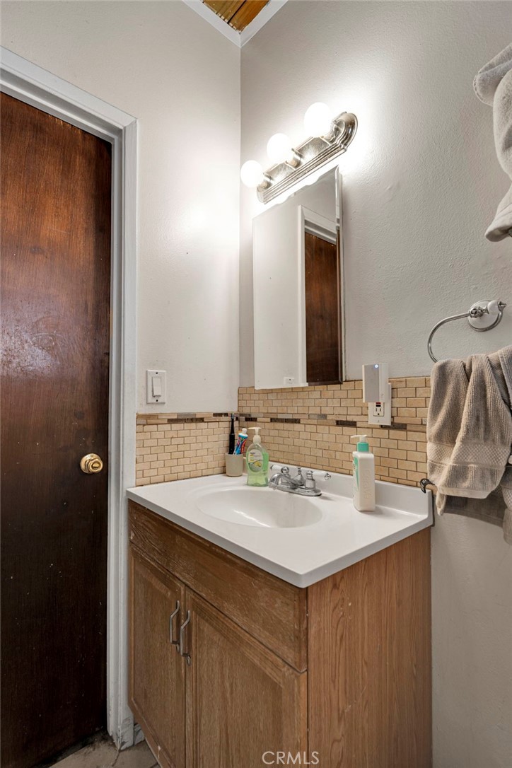 540 Frances Drive Barstow, CA 92311 - Photo 18 of 24 a bathroom with a sink and a mirror