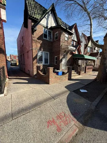 front view of a house with a pathway