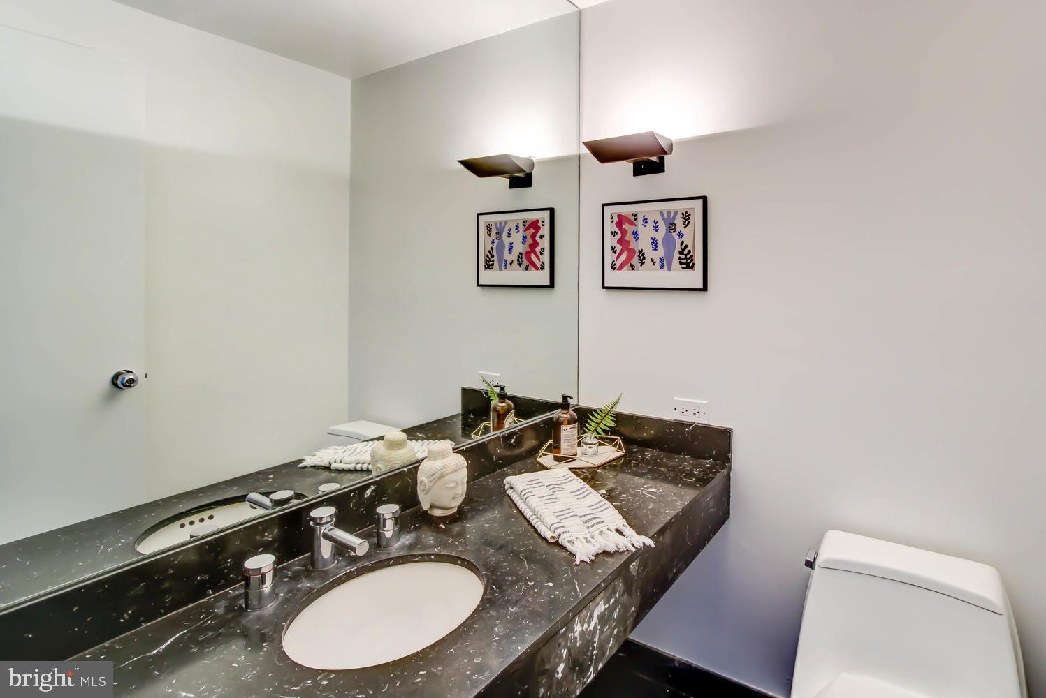 2501 M Street Northwest, Unit 722 Washington, DC 20037 - Photo 17 of 39 First floor half bath