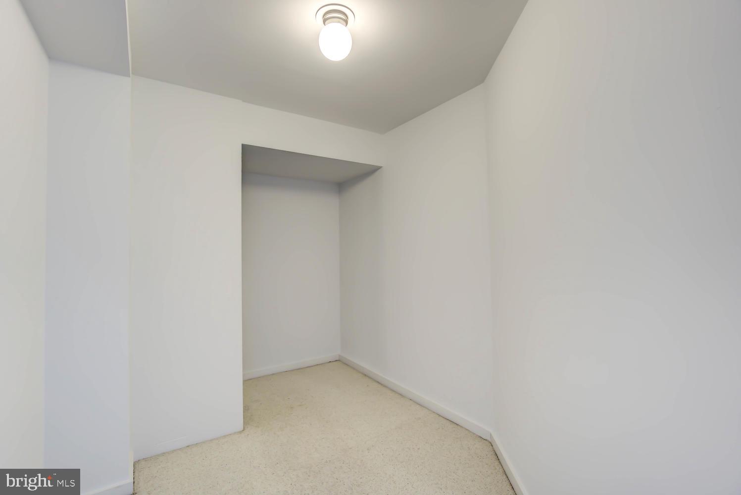 2501 M Street Northwest, Unit 722 Washington, DC 20037 - Photo 22 of 39 Walk-in closet (includes current W/D)