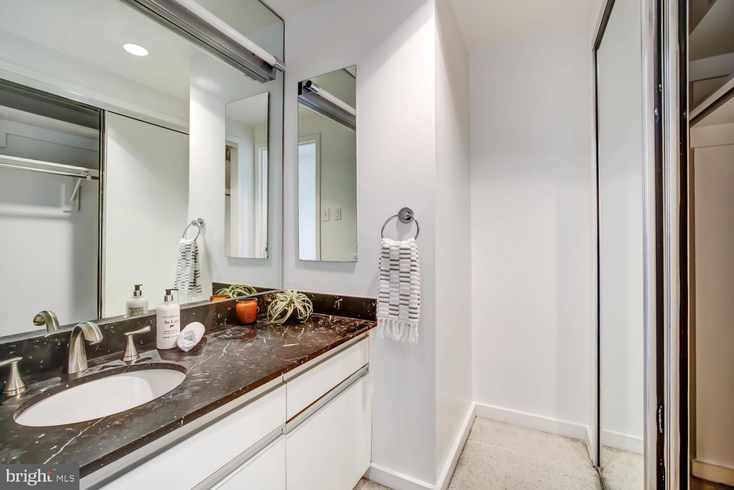 2501 M Street Northwest, Unit 722 Washington, DC 20037 - Photo 23 of 39 Xtra sink + closet - relocate laundry here!