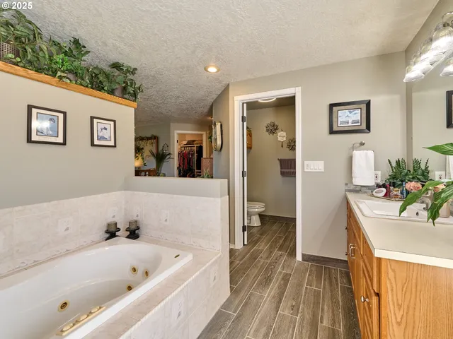 a bathroom with a bathtub and a sink