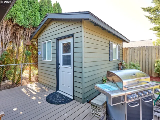 a backyard of a house with seating space