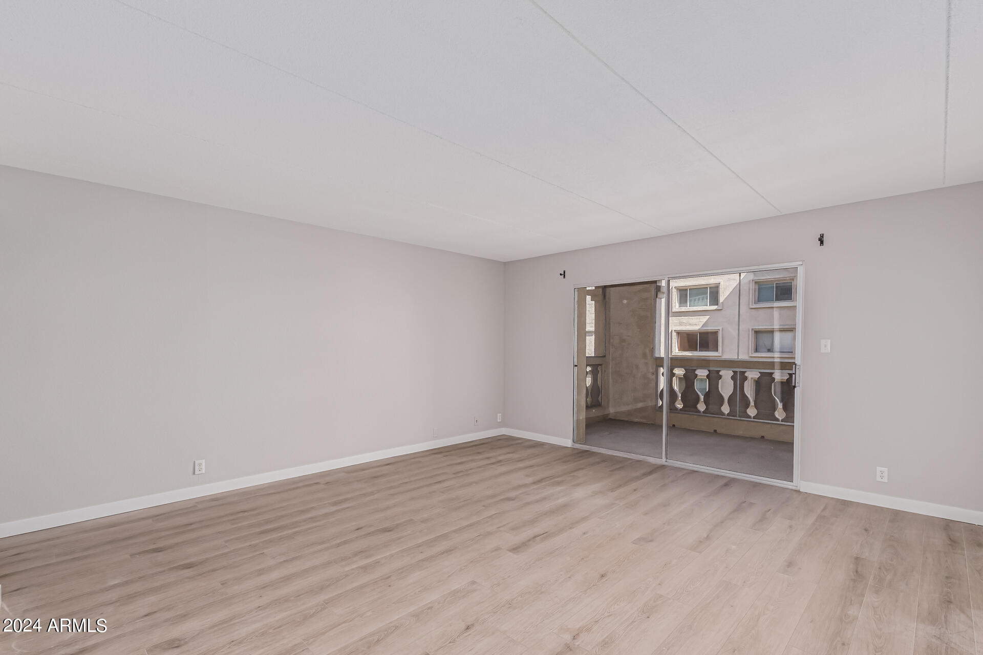 7930 East Camelback Road, Unit 506 Scottsdale, AZ 85251 - Photo 13 of 58 a view of an empty room with a window