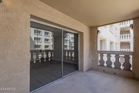 a view of a building from a balcony