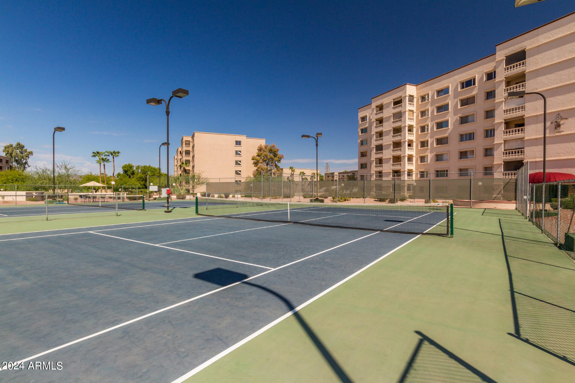 7930 East Camelback Road, Unit 506 Scottsdale, AZ 85251 - Photo 42 of 58 a view of a tennis court