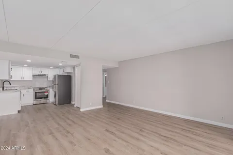 a view of kitchen with wooden floor
