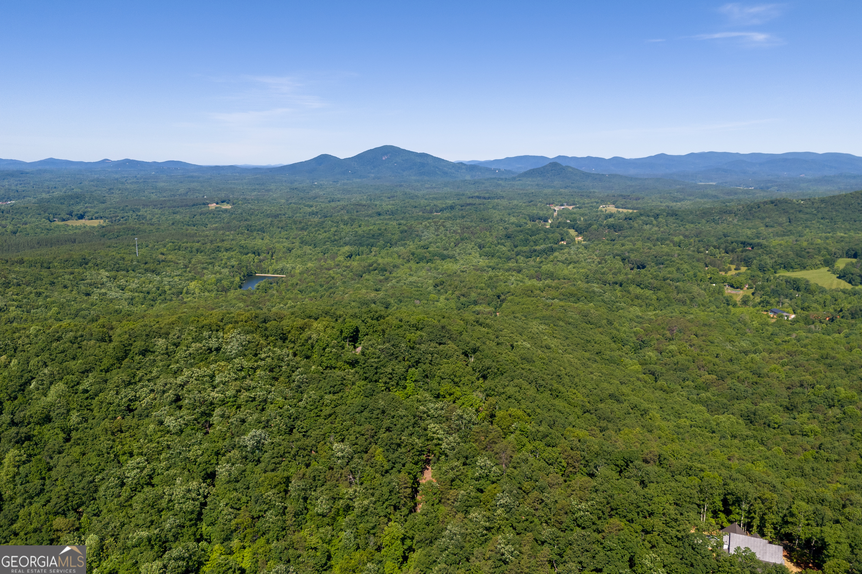 5012 Alec Mountain Road Clarkesville, GA 30523 - Photo 25 of 37 a view of a town with mountains in the background
