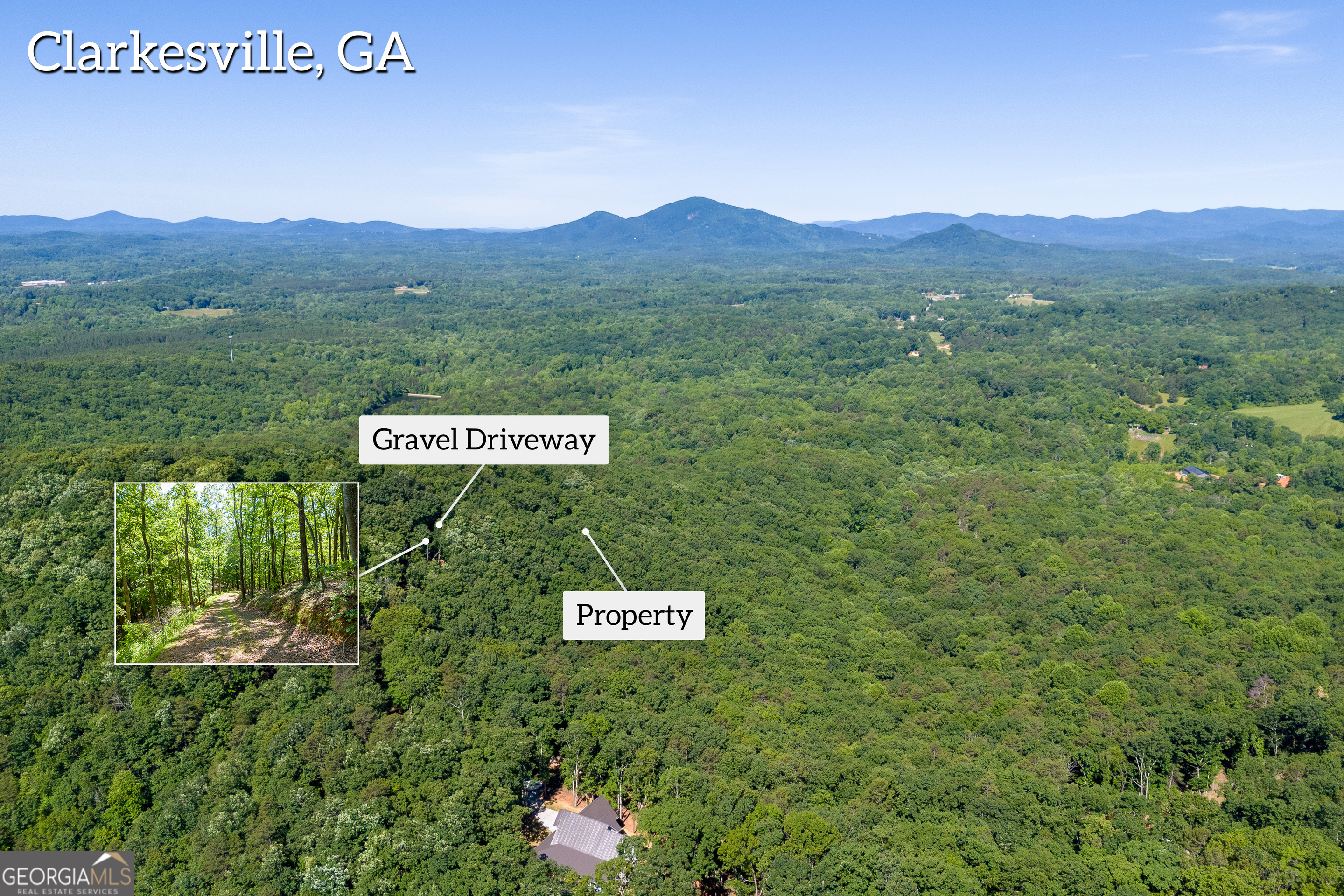 5012 Alec Mountain Road Clarkesville, GA 30523 - Photo 8 of 37 a sign that is sitting on a brick wall