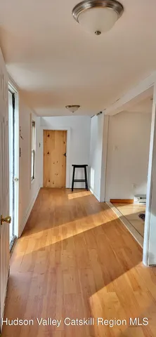 a bedroom with a bed and a cabinets