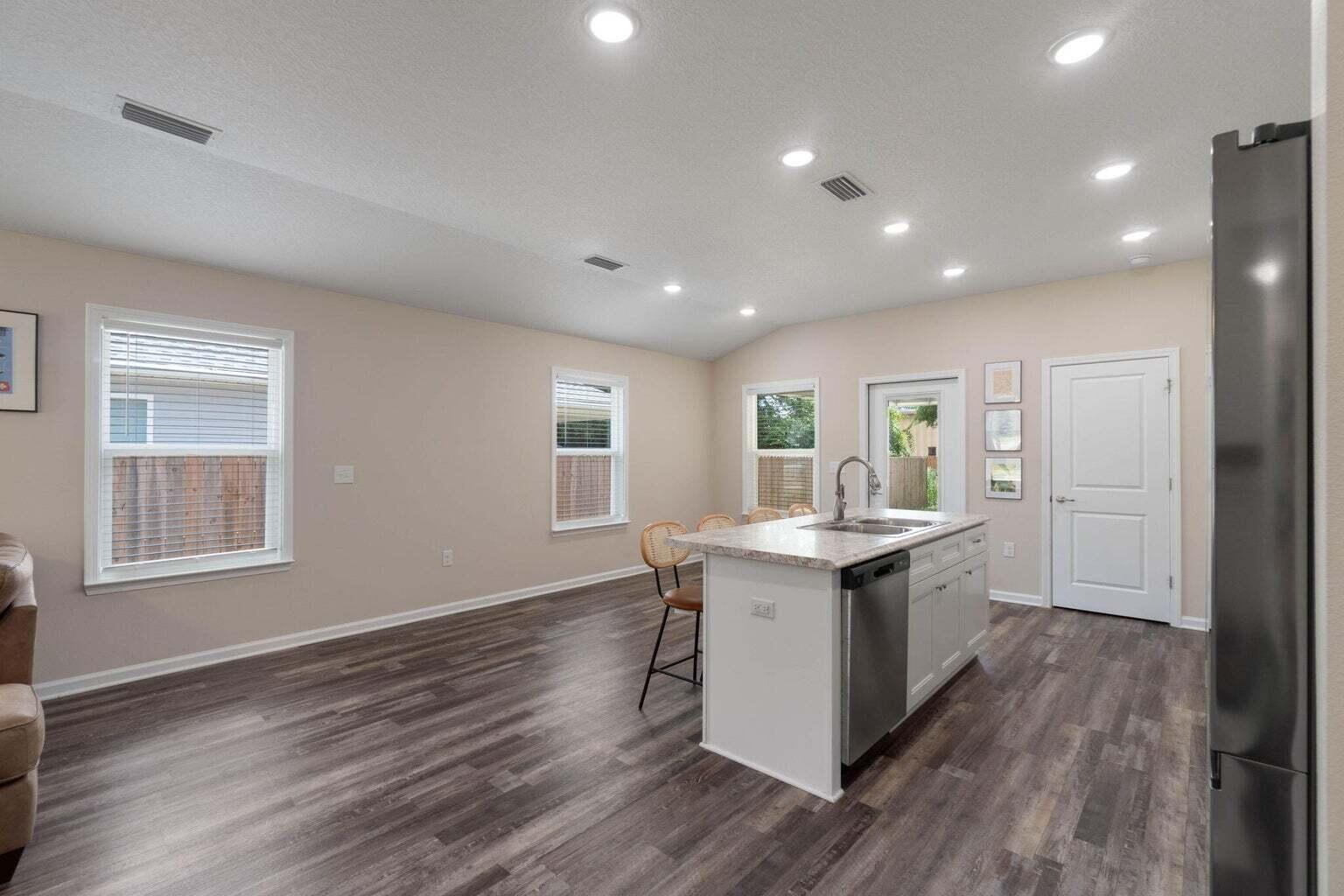 952 Mapoles Street Crestview, FL 32536 - Photo 8 of 32 a view of kitchen with sink microwave and stove