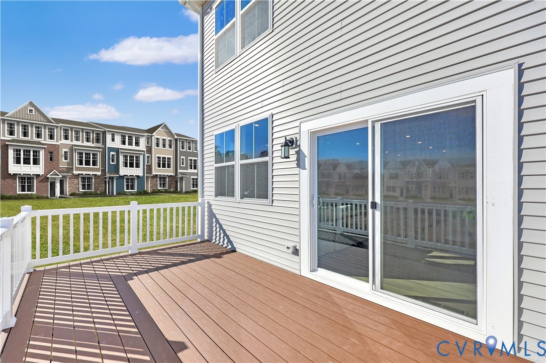 6103 Primrose Path Road Richmond, VA 23225 - Photo 25 of 27 a view of a house with a porch