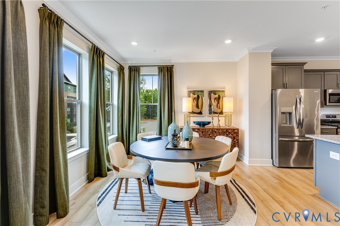 6103 Primrose Path Road Richmond, VA 23225 - Photo 10 of 23 a dining room with furniture and window