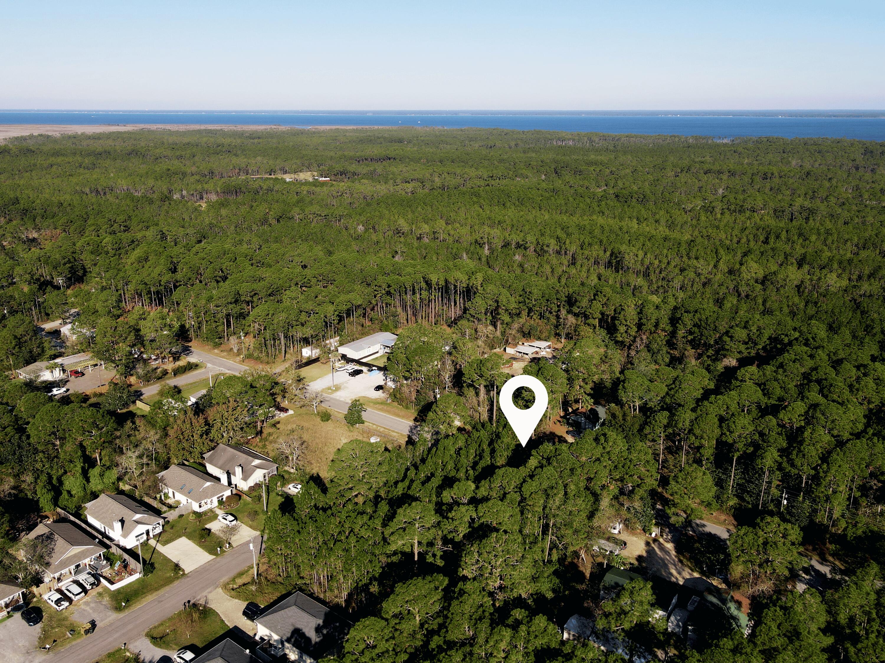 Lot24-blk5 North 6th Street Santa Rosa Beach, FL 32459 - Photo 3 of 4 an aerial view of a house with a yard