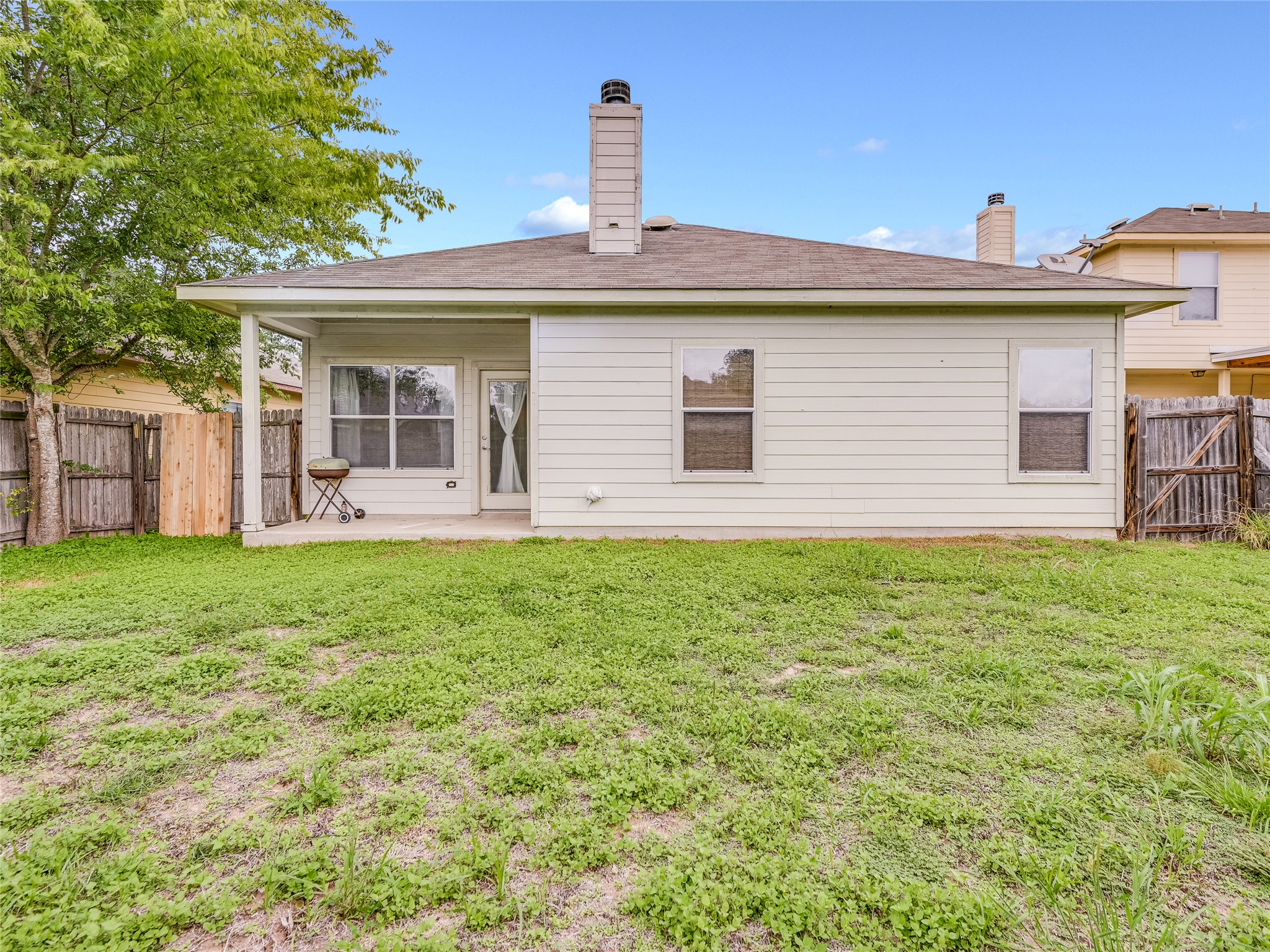 11401 Dimmitt Street Manor, TX 78653 - Photo 23 of 23 a front view of a house with garden