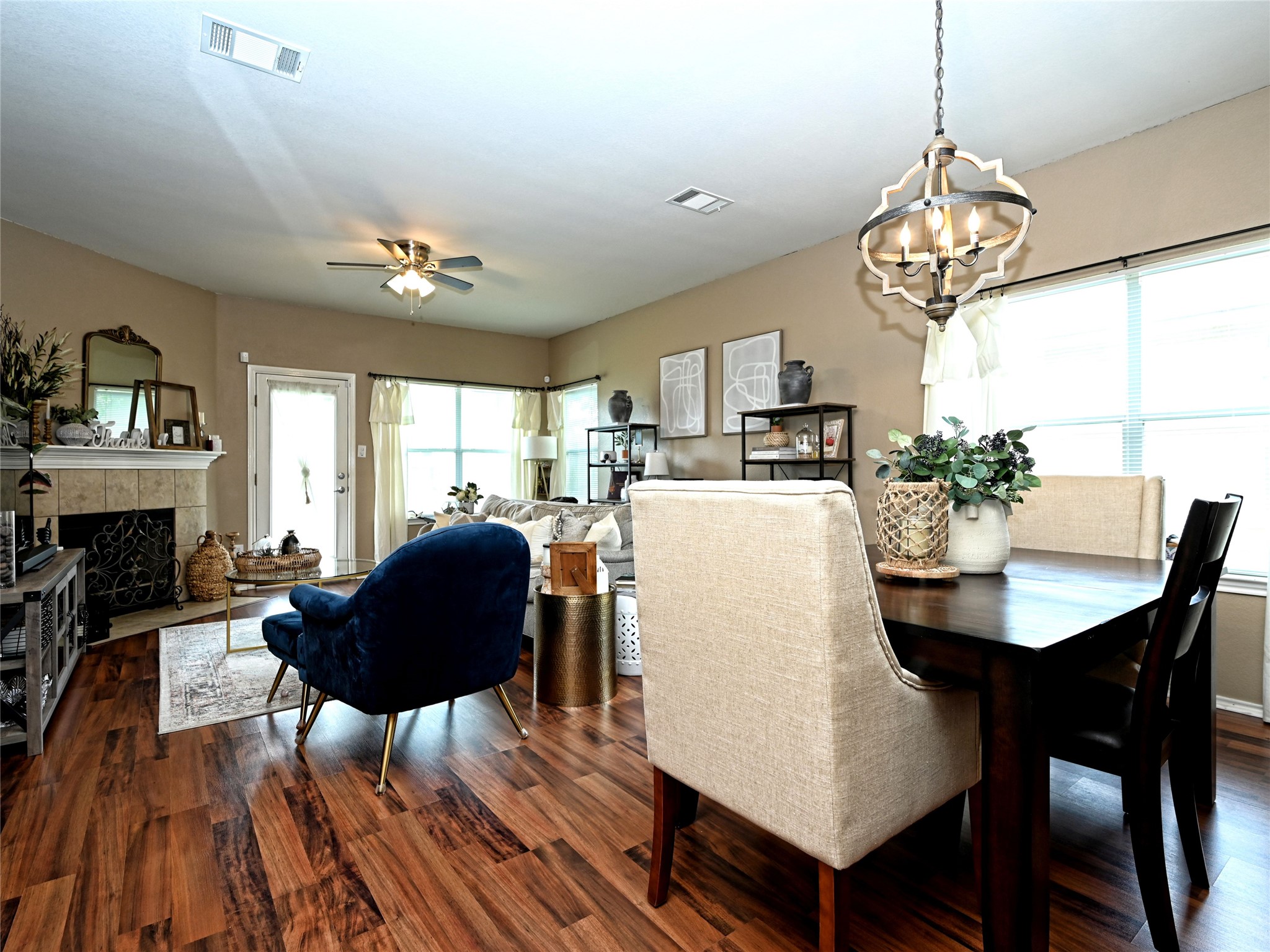 11401 Dimmitt Street Manor, TX 78653 - Photo 7 of 23 a view of a dining room with furniture window and wooden floor