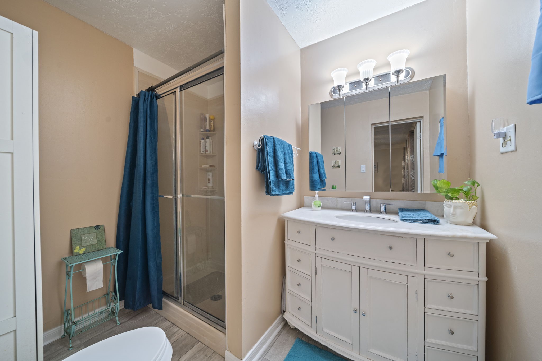 3805 Darling Street Pasadena, TX 77503 - Photo 11 of 23 a bathroom with a granite countertop sink vanity and mirror