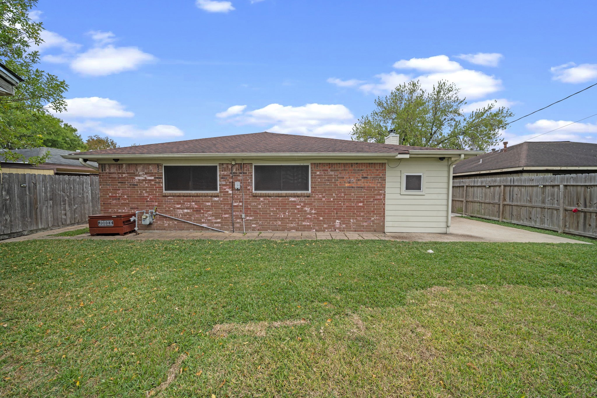 3805 Darling Street Pasadena, TX 77503 - Photo 18 of 23 a front view of house with yard and trees in the background