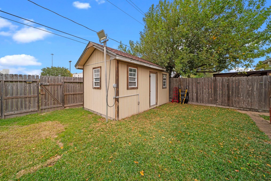 3805 Darling Street Pasadena, TX 77503 - Photo 19 of 23 a view of a backyard with wooden fence
