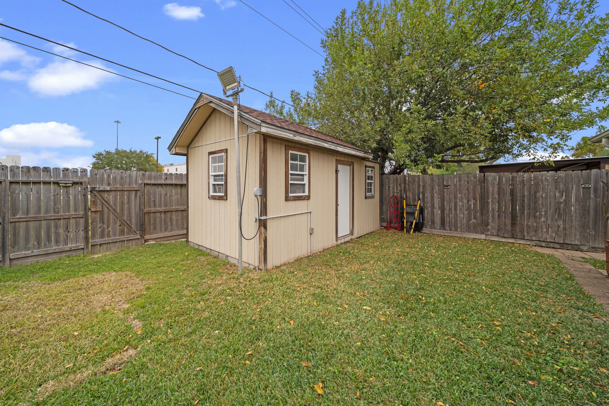 3805 Darling Street Pasadena, TX 77503 - Photo 19 of 23 a view of a backyard with wooden fence
