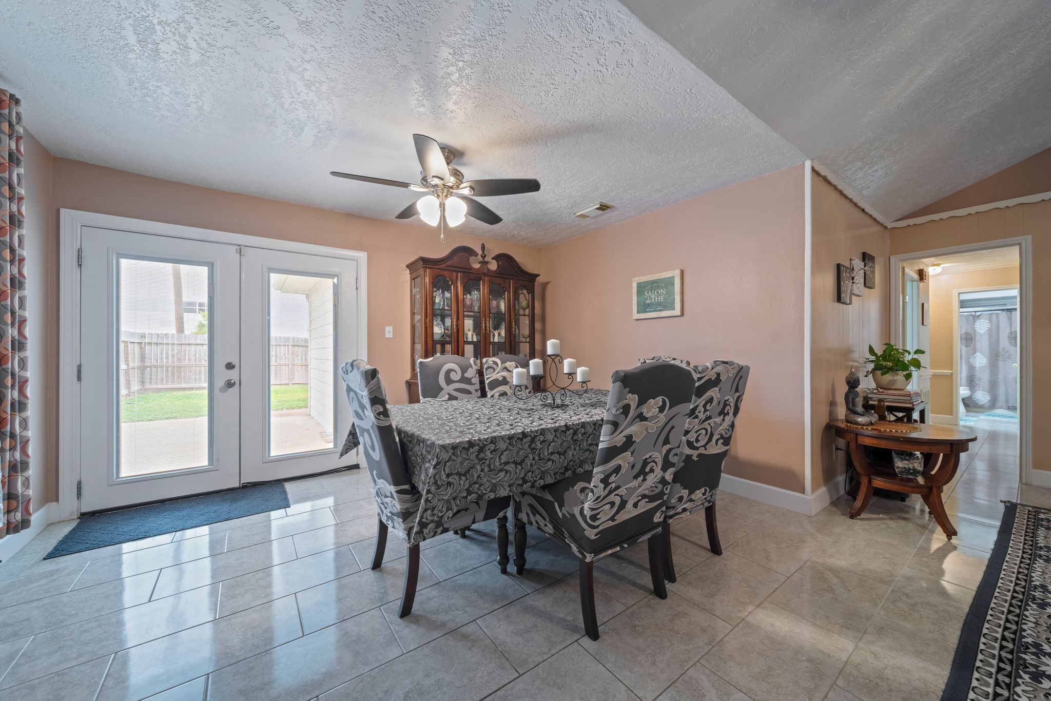 3805 Darling Street Pasadena, TX 77503 - Photo 8 of 23 a view of a dining room with furniture and chandelier