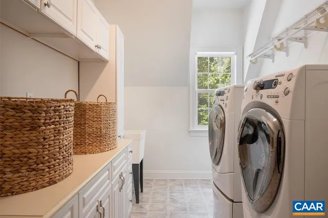 a view of a livingroom with furniture window and wooden floor