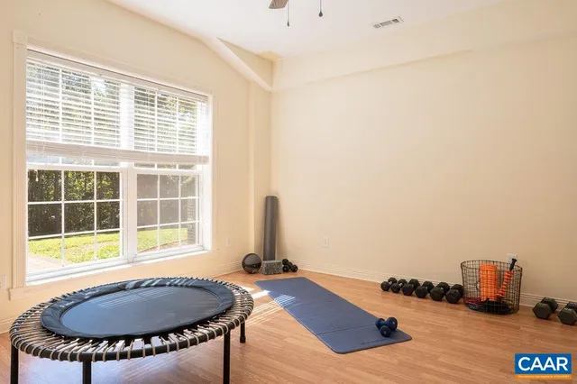 a view of a workspace with furniture