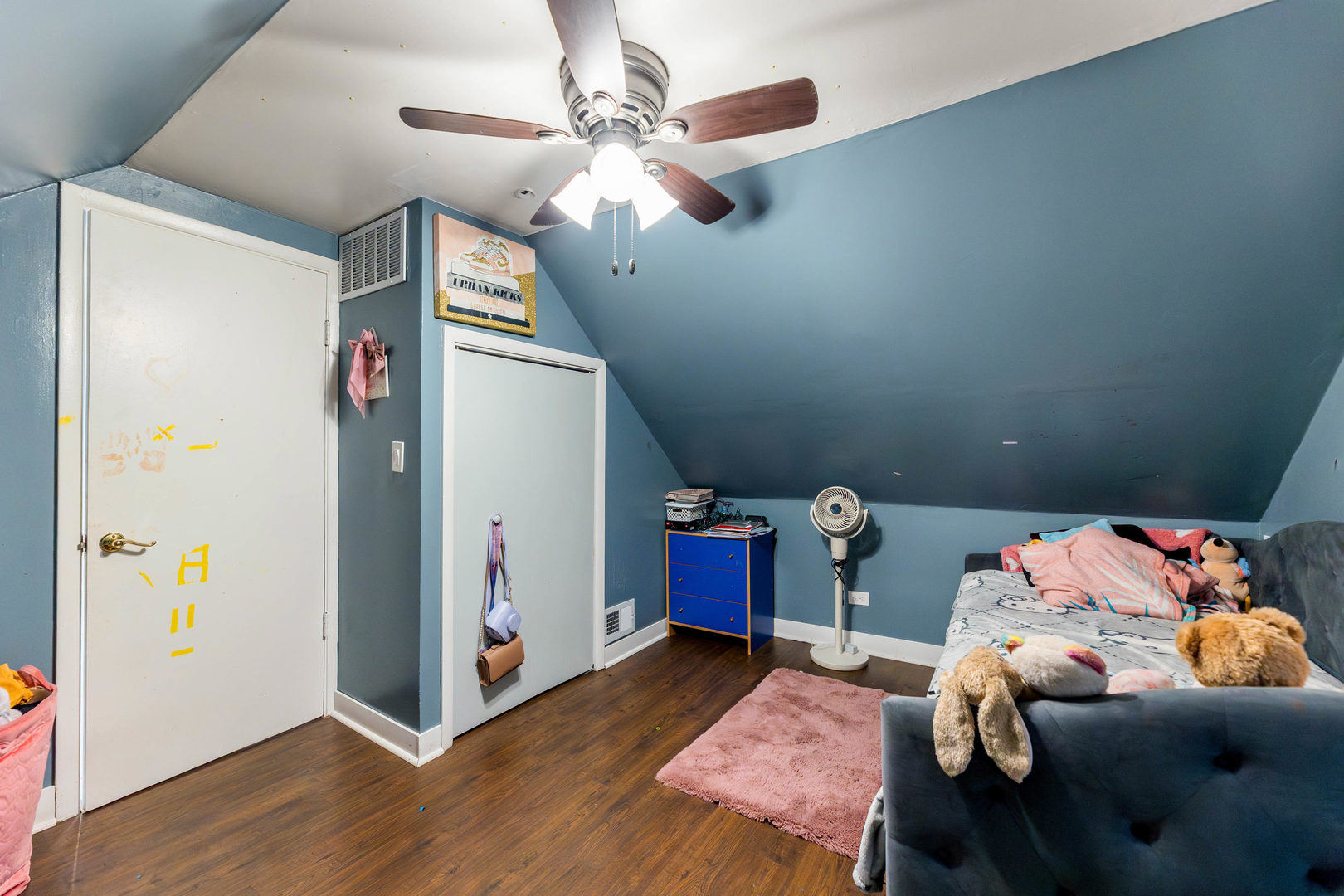 4147 Gage Avenue Lyons, IL 60534 - Photo 16 of 33 a bedroom with furniture and a chandelier